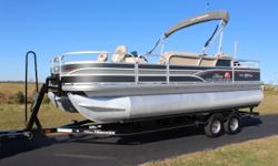 2015 Suntracker Fishin Barge 22 DLX
22' Charcoal and black with full Vinyl flooring cover. Equipped with Minnkota Pontoon digital pontoon 54lb. thrust 12 volt trolling motor, sonar panel on board charger, Minnkota Electric anchor, Jensen Stereo with blue