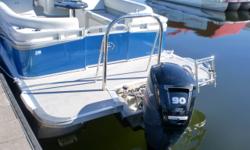 This boat was in our rental fleet this year. It has a Mercury 90hp 4 stroke motor. It has plenty of power to pull tubes. It has a vinyl floor, docking lights, ski tow, chrome package, and USB/Aux input for the stereo. The MSRP on this boat was 33950.00.
