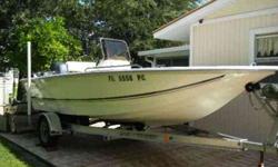 Coastal Marine Center, Inc. 19BayDC Located in Nokomis, FL.
Call Coastal Marine at 888-459-0227 or email (email removed) for more details.
With 115 HORSEPOWER Yamaha motor, bimini, full / motor covers, fuel water separator, live well, rod holders, flip