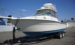 GREAT DEAL ! BIG BOAT !The sleek appearance of the 27 Walk Around is enough to get your heart racing, but there?s a lot more to this boat than simply good looks. The large unobstructed cockpit features a molded-in stern bait well, cleaning station and a