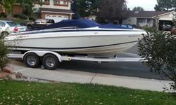 This 1996 Cobalt 200 is Navy/White with 500 hours. It's powered by a 5.7 LX V8 Thunderbolt V Ignition MerCruiser engine with 190 HP. IT's length is 20 feet long with a beam of 8'2". Equip with this boat is a bimini, boat cover and the trailer. It has a