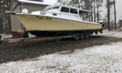 New Listing! This 2010 Markley 35 with triple 300 hp Suzuki outboards was built on a Kinnamon hull laid up by Glann Manning of Cambridge, Md., one of the Chesapeake By areas most reputable boat builders. Hulls produced by Manning are one of the most