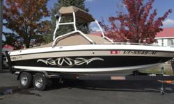 This Malibu needs a new home. This classy color combo looks good on and off the water. It has 411 hours on the Indmar Monsoon motor. It also comes with 6 tower speakers, 7 tower lights, speaker/light cover, bimini, heater, shower, bow filler cushion,