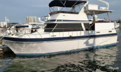 Cool Breeze is a classic 38' Californian Motor Yacht offering a full beam master stateroom aft, galley down layout and a large sundeck and flybridge. She has a lower helm station with a deck door, beautiful dark mahogany paneling, generous storage,