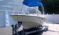 Nice Mills Bimini top with boot that was barely used.Boat can go in a foot of water or handle ocean and bay with a dry ride.Foam filled hull. Very stable, Floats like a cork and is completely Unsinkable!