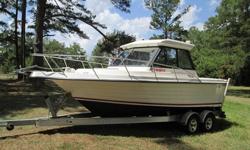 Fish and Pleasure Cruiser with only 65 hours on the meter, Boat was dry stored for years then brought out this summer.Like new boats.