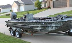 2002 21ft F & F custom built jon boat and a 1994 150 hp Mercury outboard. This is the ultimate fishing, hunting and pleasure boat. You can fish out of it all morning and ski and tube all afternoon. It is 88 inches wide with 24 inch sides so it can take on