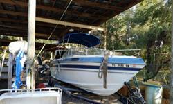 22 foot 330 HP 7.4 litre Mercruiser w/New Bravo 1 outdrive, A Barn find with only 70 hours ORIGINAL HOURS !. Sounds like a cigarette boat , started on third bump, new hydraulics and Stainless Steel Exhaust , Magnum Transom assembly, and Bravo 1 replaced
