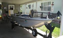 14ft Fiberglas Boat completely renovated, Exc. Cond. has large front casting deck,aerated live well, storage locker, 2 new pedestal fishing seats, New Minkota trolling motor, 2 new batteries, 6 gal gas tank & a 3 Gal gas tank bilge pump, trailer and