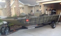 2011 Tracker Grizzly 1648 single console boat with livewell. This boat is in excellent condition with less than 40 hours on the engine. It has a 2011 (4) cycle 50 HP outboard Mercury EFI. The boat comes with a 2011 Tracker trailer. I recently added a new