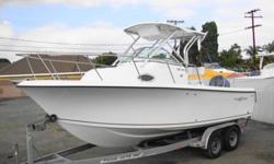 WOW! NEW 2009 PACKAGE!ZERO HOURS ON ENGINE!?BOAT AND ENGINE HAVE FULL WARRANTIES!!!!! If you want the feel of a center console, with the comfort of a walk around cuddy, the Sailfish 218 WAC is the boat for you and your family. A spacious cabin equipped