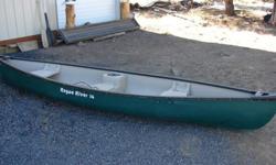 I'm selling my 14ft Rogue River canoe. Wider design than most other canoes which improves overall stability. Made from rugged polymer materials. Three molded-in seats with a drink cooler in the middle seat. Two molded handles at the front and back make