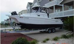 2005 ProKat 2660 WA True planing hull rides high and dry, 4 speaker Surround Sound, 13" flat screen TV 10 CD disc changer, Electric head and refrig.,Trac Vision 3 Satellite TV system, Full curtain enclosure. Raymarine 120 GPS/Fishfinder, power steering,