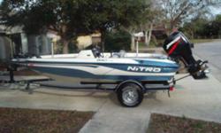 2004 Nitro 640 LX Tracker 16 4 Bass Boat with upgrade 90 horsepower outboard engine. Comes with boat cover, trailer, (2) props- 4 blade stainless steel and factory propeller, 12 volt trolling engine, onboard charger, extra seat, two depth finders - 1 is