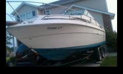 1986 Sea Ray 245 Weekender. Play all day and stay all night! Boat is in excellent condition - only two owners. Installed back bench seat. Carpet is 2 years old. 2 new marine batteries. MerCruiser engine. Battery in the boat and inverter to run a tv. Boat