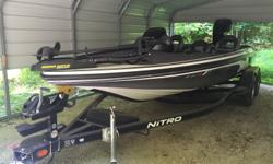 2014 Tracker Marine Nitro Z8 Bass Boat. Optimax 200 HP. Last used July 2014. Engine run under 1 hour. Still smells like a brand new boat. 70 MPH . Had upgrades installed and bow guard installed. Oil fill cap installed on outside , no need to open hatch to