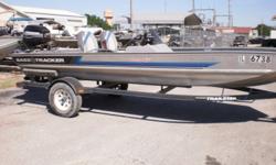 1993 Bass Tracker Pro 17 on a Bass Tracker trailer with a 200 40 hp Mercury. The boat has a right steering console, carpet floors, 2 rear seats, a seat mount on the front bow, left side, front, and rear storage, and a Pro Series 1000 Eagle fish finder.