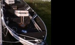 14' Sea King, fully carpeted, foam filled bench seats, 2 anchor mates - bow and stern, pitching deck in bow, two seats, middle bench seat, small storage in bow, rod holders, and has a bracket to hold a metal mesh live basket (the rusty thing under the