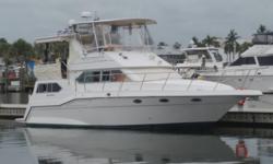 Rare diesel powered Cruisers Yacht! Powered by twin Caterpillar 3116 Turbo Diesels that cruise comfortably around 20 kts, piloted from a big flybridge with recent upholstery on the helm chairs and guest seating. This is a sleek looking boat with an