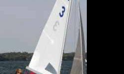 1976 Johnson X-boat racing scow built by Johnson Boatworks in White Bear Lake, MN. Two complete sets of sails (North Sails) and an extra jib set for light wind. Recent professional paint job with spare paint for touch-up. Trailer is near-new and includes
